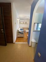 Posteľ alebo postele v izbe v ubytovaní Irini Seaside Apartment