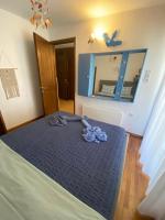 Posteľ alebo postele v izbe v ubytovaní Irini Seaside Apartment