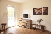 TV a/nebo společenská místnost v ubytování Nora Apartments