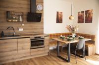 Kuchyň nebo kuchyňský kout v ubytování Nora Apartments