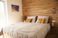 Postel nebo postele na pokoji v ubytování Nora Apartments
