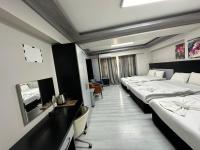 Postel nebo postele na pokoji v ubytování Retrol Hotel