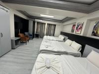 Postel nebo postele na pokoji v ubytování Retrol Hotel