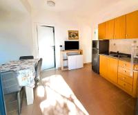 A kitchen or kitchenette at Case Vacanze Pietragrande