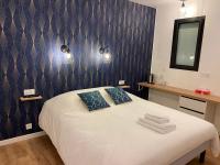 La Maison Blancheにあるベッド