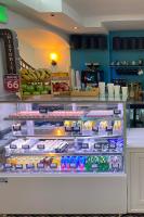 a refrigerator filled with lots of different types of food at Hollywood Hotel in Los Angeles