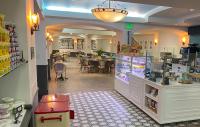 a grocery store with a counter and a restaurant at Hollywood Hotel in Los Angeles