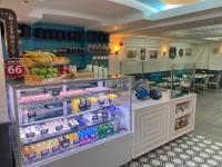 a store with a refrigerator filled with lots of drinks at Hollywood Hotel in Los Angeles