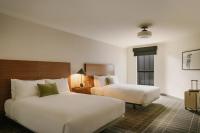 Ein Bett oder Betten in einem Zimmer der Unterkunft FOUND Hotel, Santa Monica