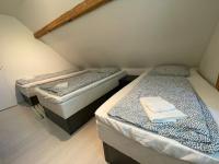 Postel nebo postele na pokoji v ubytování Billund Travelling Sun