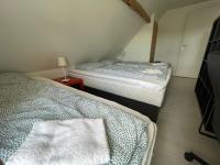Postel nebo postele na pokoji v ubytování Billund Travelling Sun