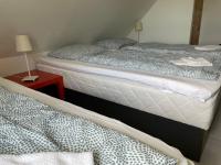 Postel nebo postele na pokoji v ubytování Billund Travelling Sun