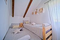 Posteľ alebo postele v izbe v ubytovaní Kuća za odmor Amarie 4*