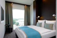 Postel nebo postele na pokoji v ubytování Motel One Amsterdam