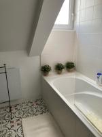 Kúpeľňa v ubytovaní Duplex Vannes centre