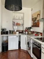 Kuchyňa alebo kuchynka v ubytovaní Duplex Vannes centre
