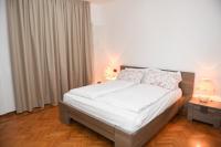 Łóżko lub łóżka w pokoju w obiekcie Villa Sergio