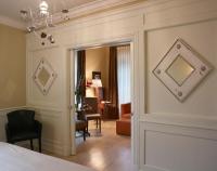 Palazzo Firenze by Baglioni Hotels & Resortsにあるベッド