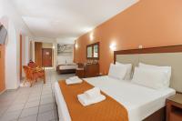 Posteľ alebo postele v izbe v ubytovaní Agrabella Hotel