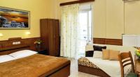 Posteľ alebo postele v izbe v ubytovaní Hotel Admitos