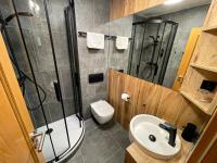 Koupelna v ubytování Wellness Hotel Grand