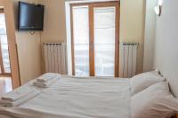 Postel nebo postele na pokoji v ubytování Zvezditsa Chalet
