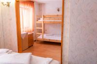 Postel nebo postele na pokoji v ubytování Zvezditsa Chalet
