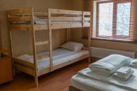 Postel nebo postele na pokoji v ubytování Zvezditsa Chalet