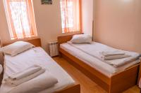 Postel nebo postele na pokoji v ubytování Zvezditsa Chalet