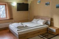 Postel nebo postele na pokoji v ubytování Zvezditsa Chalet