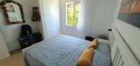 A bed or beds in a room at Las Golondrinas - RISSAGA
