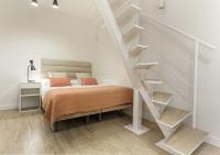 A bed or beds in a room at Apartamento Retiro V en Madrid