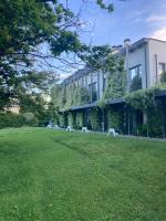 A garden outside Mxp Rooms Guest House