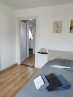 Posteľ alebo postele v izbe v ubytovaní 2e étage appartement entier 3 pièces idéal 2 personnes, 2 chambres communiquantes en enfilade, WIFI, espace travail parking gratuit