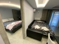 Posteľ alebo postele v izbe v ubytovaní Evelina’s house