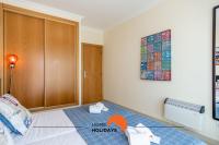#160 V3 Vila Branca 92 by Home Holidaysにあるベッド