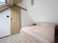 Łóżko lub łóżka w pokoju w obiekcie Escapade marine a carnac Maison 4 personnes toute équipée, au calme entre plage et ville