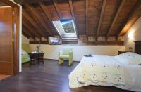 Postel nebo postele na pokoji v ubytování Hotel Rural El Fundil