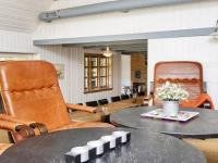 Posezení v ubytování 14 person holiday home in Ulfborg