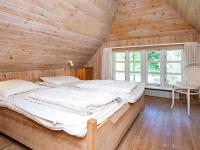 Postel nebo postele na pokoji v ubytování 14 person holiday home in Ulfborg