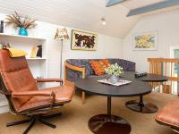 Posezení v ubytování 14 person holiday home in Ulfborg