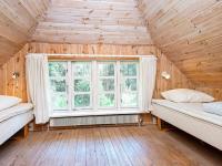 Postel nebo postele na pokoji v ubytování 14 person holiday home in Ulfborg