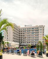 a view of the dominica hotel from the pool at Coastline Luxury Apart Hotel in Golem
