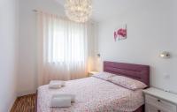 Postel nebo postele na pokoji v ubytování Holiday Home Fazana 23