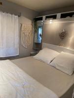 Posteľ alebo postele v izbe v ubytovaní Camping Oasis village
