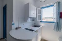 A kitchen or kitchenette at Sunflower Apartments & Studios
