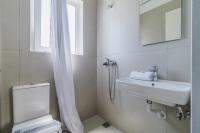 A bathroom at Sunflower Apartments & Studios