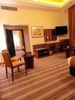 Royal Qatar Hotelにあるテレビまたはエンターテインメントセンター