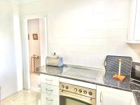 A kitchen or kitchenette at APARTAMENTO AGUAMARINA Nsf54 -NERJA