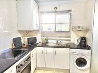 A kitchen or kitchenette at APARTAMENTO AGUAMARINA Nsf54 -NERJA